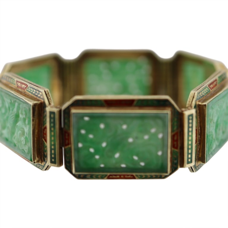 14K Carved Jade Enamel Panel Bracelet: Item/Description: Fabulous Asian inspired 14K gold station bracelet comprised of six rectangular panels of carved jade depicting figural birds nestled in foliage. Each jade segment is bezel set into a