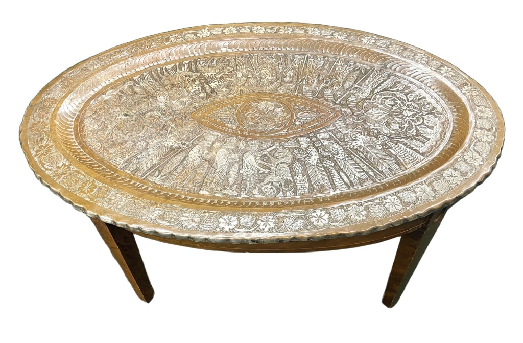 Persian Tinned Copper Tray Table: Item/Description: Tray table with an oval tinned or silvered copper tray on a four-legged wooden base. Removable tray features detailed chased and repousse imagery. A central eye-shaped medallion surr