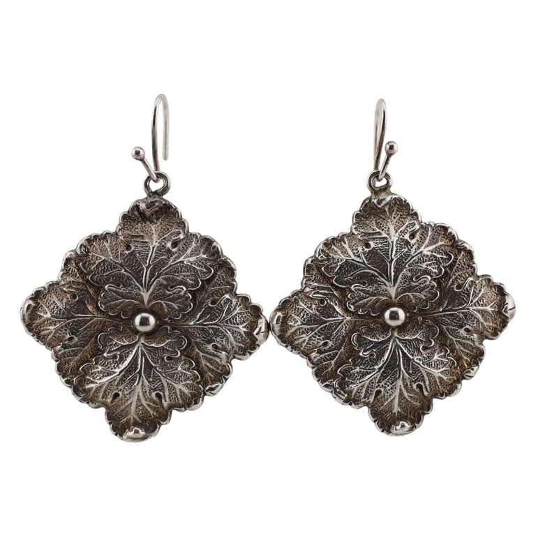 Buccellati Sterling Blossom Flower Drop Earrings: Item/Description: Exceptional sterling silver flower earrings by luxury Italian jewelry design house, Buccellati. Organic motif. Exquisitely crafted as open flower blossoms. Textured, engraved surface