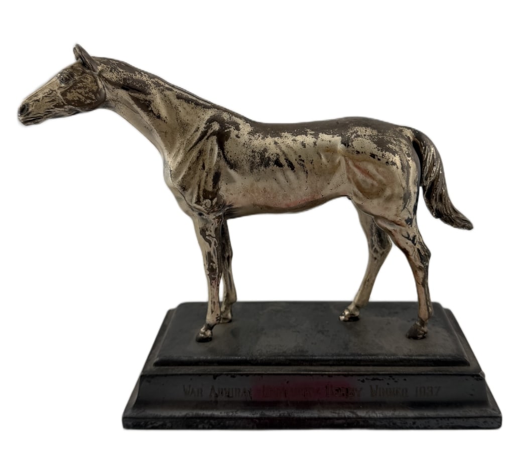 1937 War Admiral Commemorative Racehorse Statue: Item/Description: Commemorative souvenir statue of the American thoroughbred racehorse War Admiral, winner of the 1937 Triple Crown. Stallion is in a standing pose mounted to a multi-tiered ebonized b