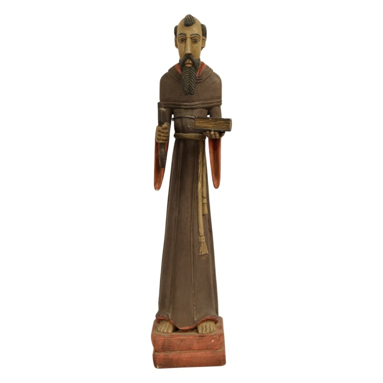 New Mexican Folk Art Santos Carved Figurine: Item/Description: Hand-carved wooden saint or bulto carved in a traditional style of early New Mexican santeros, depicting Saint Francis of Assisi holding a book and a small cross. Figure features the