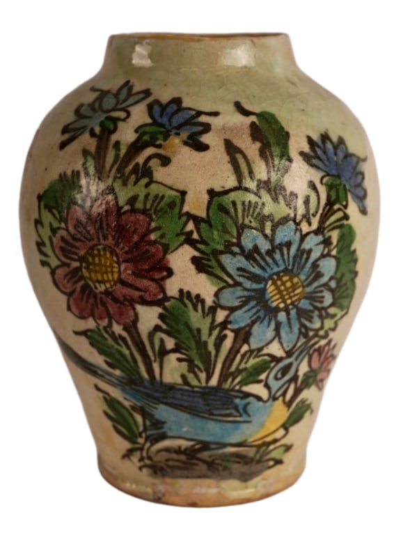 Persian Qajar Polychrome Fritware Vase: Item/Description: Antique Persian stonepaste baluster vase, crafted in the distinct folk art style of the late Qajar Dynasty. Hand-painted in vibrant polychrome slip pigments against a sandy cream gro
