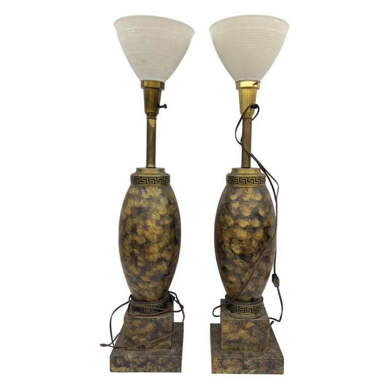 Hollywood Regency Underwriters Torchiere Lamps: Item/Description: Pair of Hollywood Regency table lamps showcases an elongated ovoid body supported by tiered geometric pedestal bases, finished in a dramatic black and gold spattered texture that emu