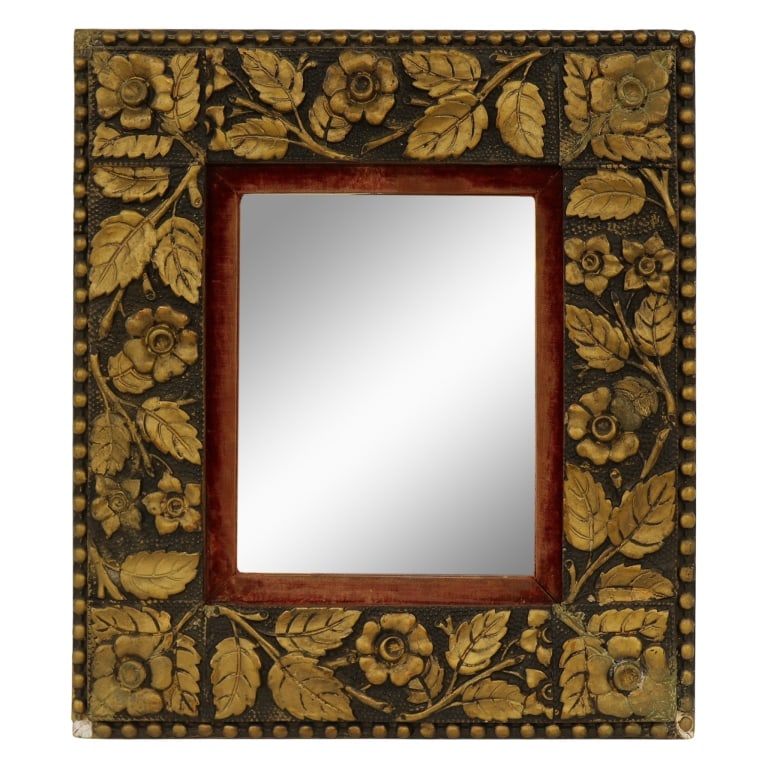 European Hand-Carved Gilded Oak Wall Mirror: Item/Description: Gilded accent wall mirror featuring a broad cushion-form frame hand-carved in high relief with a continuous, fluid botanical composition of blooming wild roses and detailed serrated