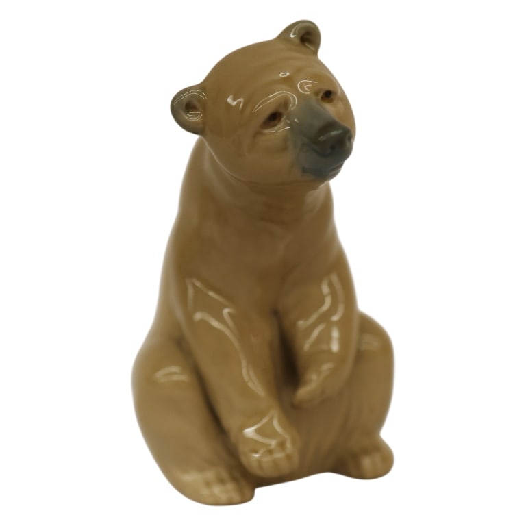 Lladro "Good Bear" Porcelain Figurine: Item/Description: Lladro "Good Bear" (#1205), brown bear porcelain sculpture. Designed by master artisan Juan Huerta. Issued in 1972, and retired in 1989. Naturalistic anatomical detailing, a gently c