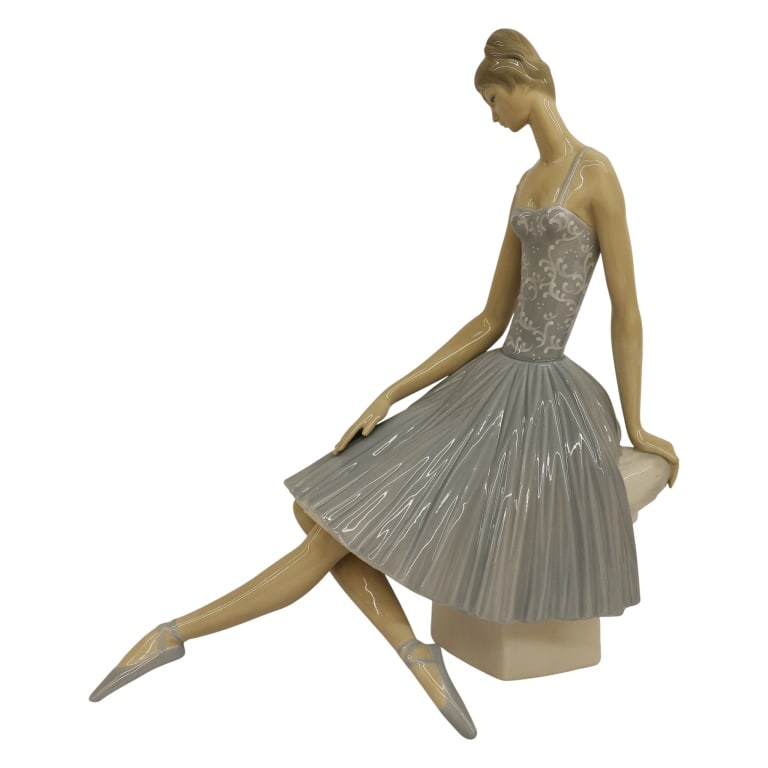 Lladro "Waiting Backstage" Ballerina Figurine: Item/Description: Lladro "Waiting Backstage" (#4559) large ballerina porcelain figurine, with a high-gloss glaze finish. Designed by Fulgencio Garcia, it was issued in 1969 and retired from production