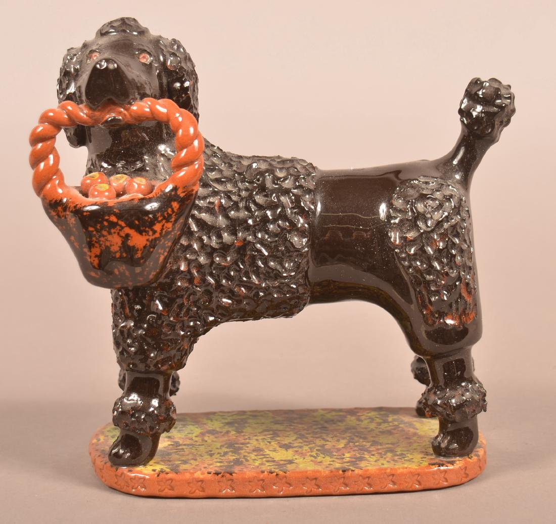 Breininger Pottery Glazed Redware Figure of a Dog. (1 of 3)