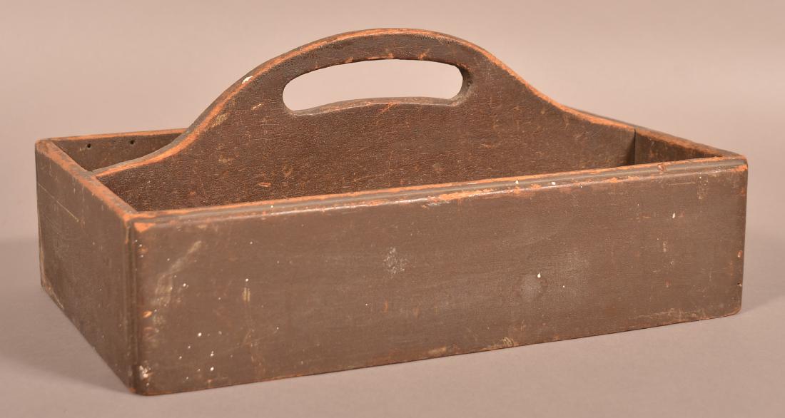 Softwood Utensil Carrier with Original Brown Paint.: Antique Softwood Utensil Carrier with Original Brown Paint. Unusual molded sides. 6"h. X 13-1/2"w. X 8-3/4"d. Condition: Good with wear.