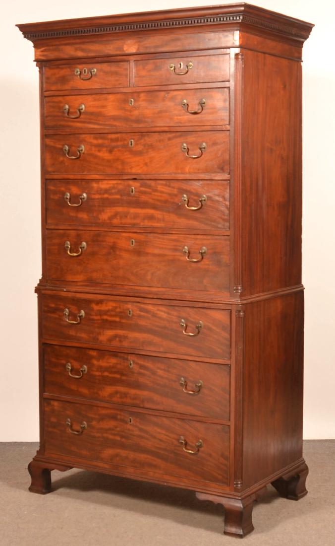Chippendale Mahogany Inlaid Chest on Chest.: Chippendale Mahogany Inlaid Chest on Chest. Ogee and dentil molded cornice, disc and sunburst inlaid frieze and two over four full width, cock beaded dovetailed drawers, fluted quarter columns. Lower 