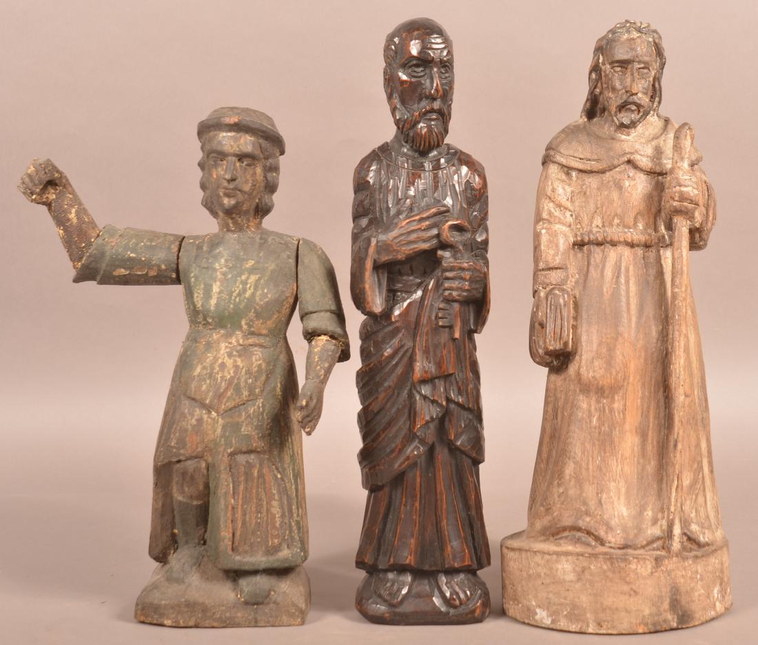 Three Antique Carved Wood Santos Figures. (1 of 2)