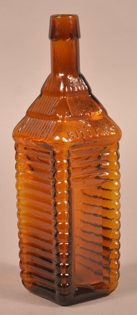 Amber Glass Cabin Form Bitters Bottle. (1 of 3)