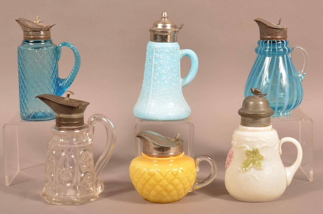 Six Various Glass Syrup Jugs. (1 of 3)