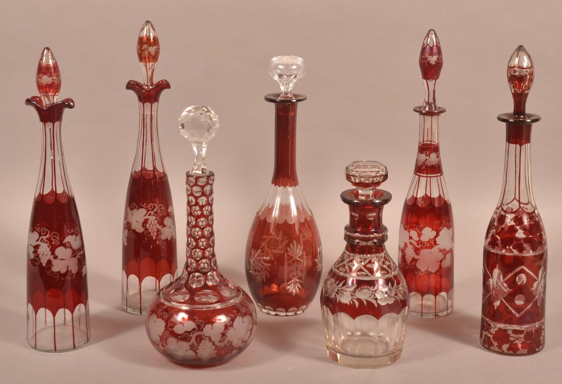 Seven Bohemian Ruby Glass Decanters. (1 of 1)