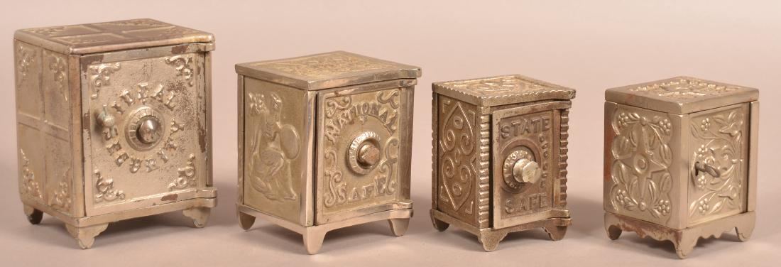 Four Nickle Plated Cast Iron Safe Still Banks. (1 of 4)