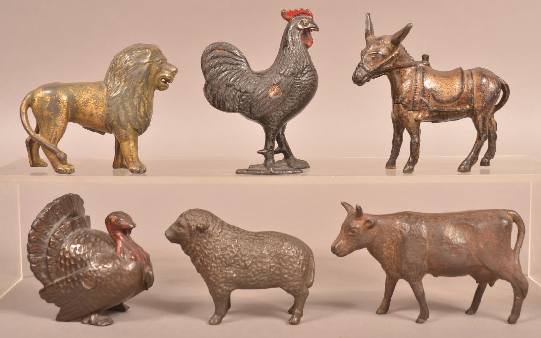 Six Antique Cast Iron Animal Figural Still Banks. (1 of 2)