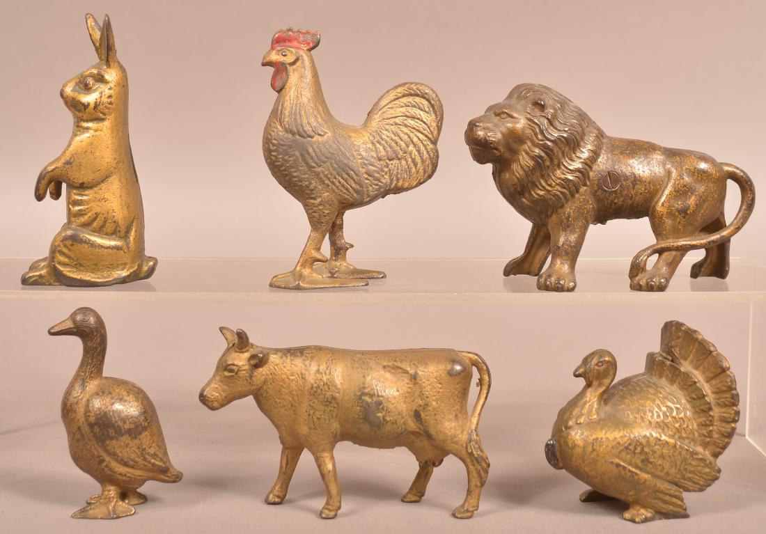 Six Antique Cast Iron Animal Figural Still Banks. (1 of 3)