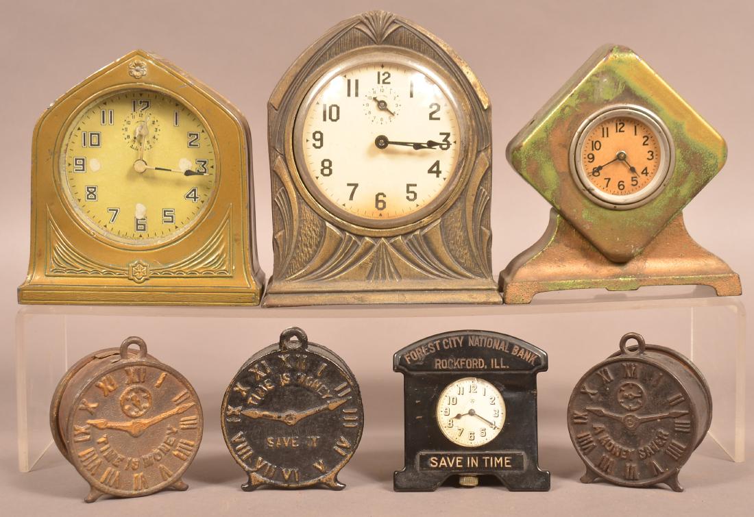 7 Cast Iron & Spelter Metal Clock Still Banks. (1 of 2)
