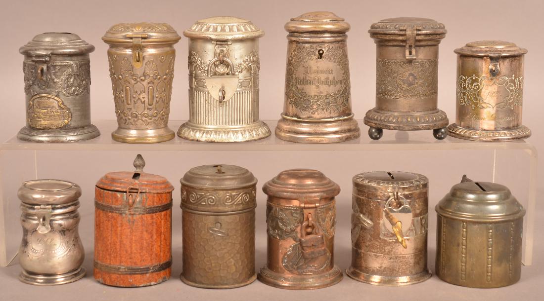 12 Various Metal Antique Stein Form Still Banks. (1 of 3)