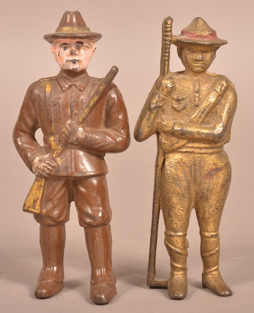 Two Antique Figural Cast Iron Still Banks. (1 of 3)