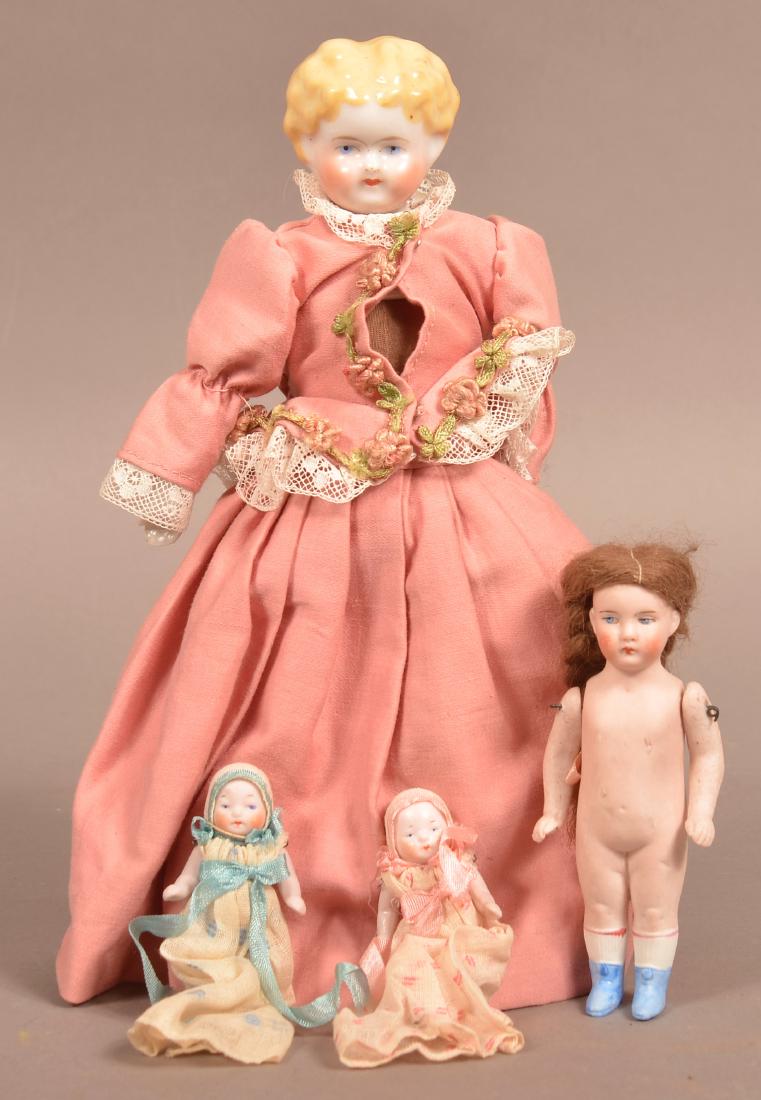 Four Various Antique China/Bisque Dolls. (1 of 2)