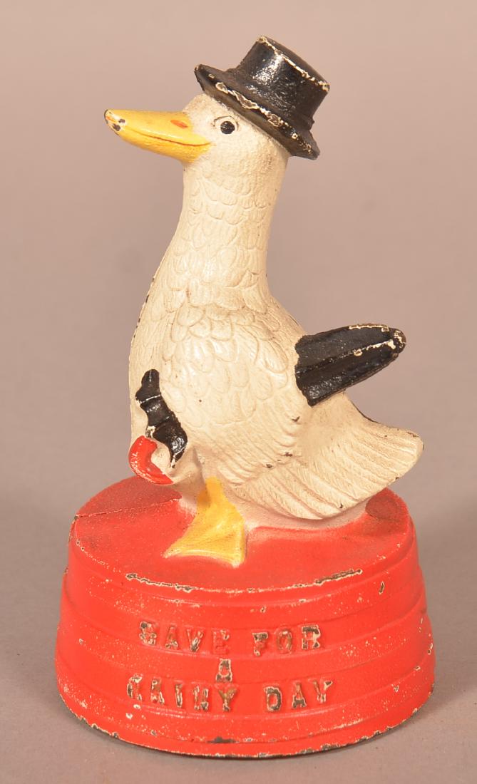 Hubley "Save For A Rainy Day" Duck Still Bank. (1 of 3)