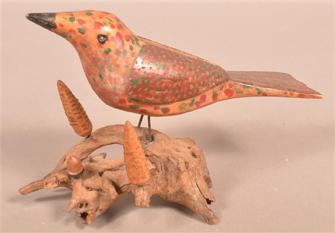 Vintage Carved and Painted Folk Art Bird on Driftwood.: Vintage Carved and Painted Folk Art Bird on Driftwood. 9-1/2"h. Condition: Good with wear and losses.