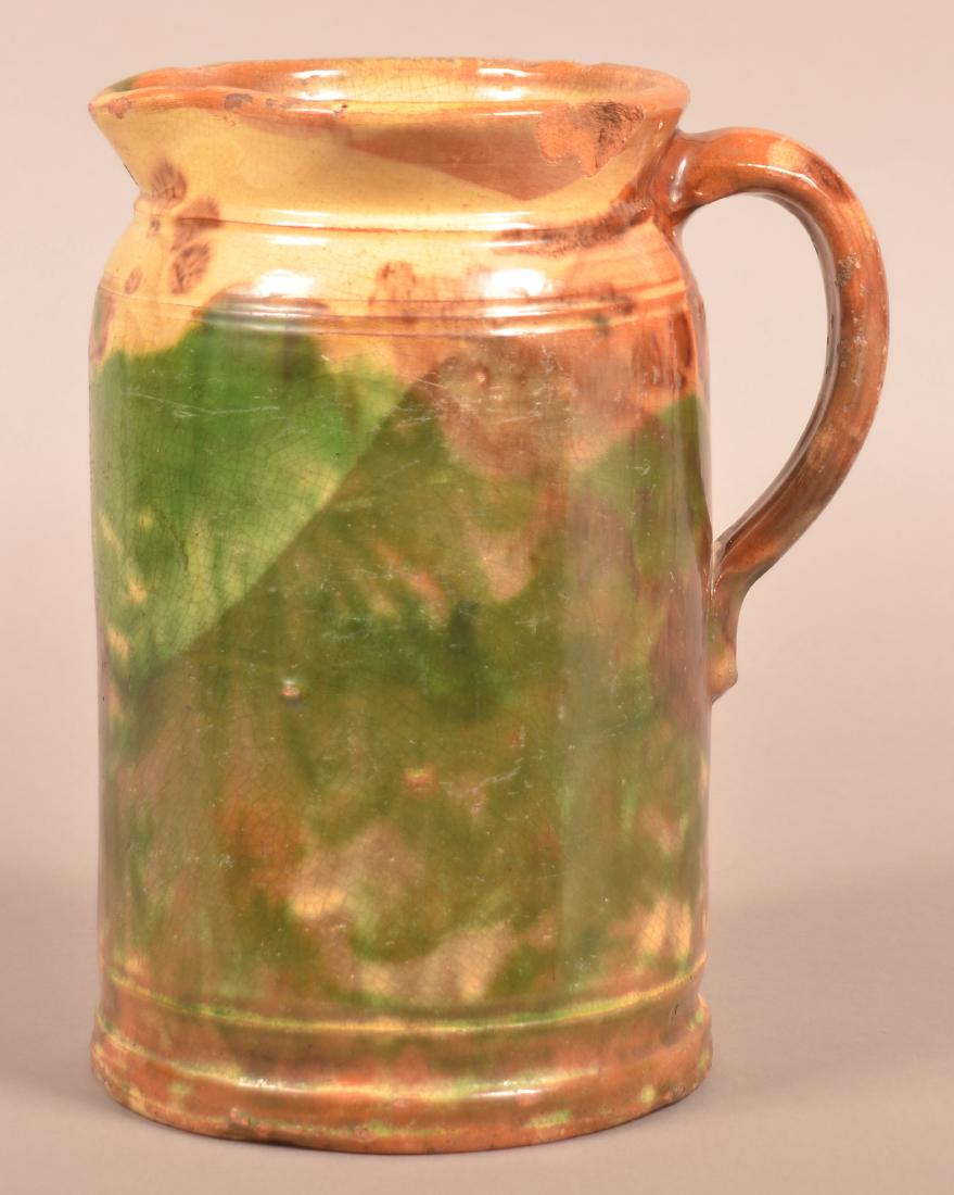Shenandoah Valley Mottled Glaze Redware Pitcher. (1 of 4)
