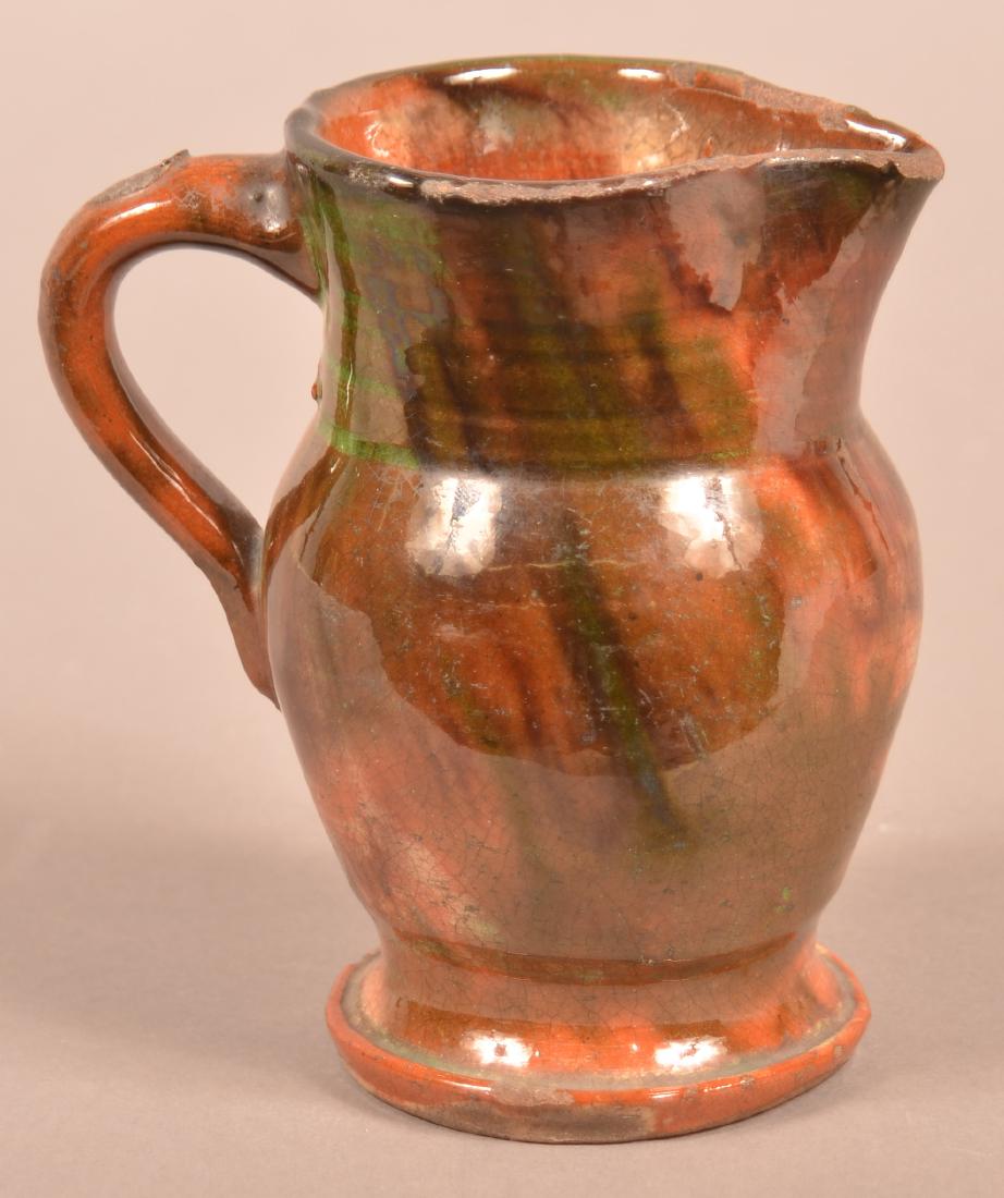 Shenandoah Valley Mottled Glaze Redware Pitcher. (1 of 4)