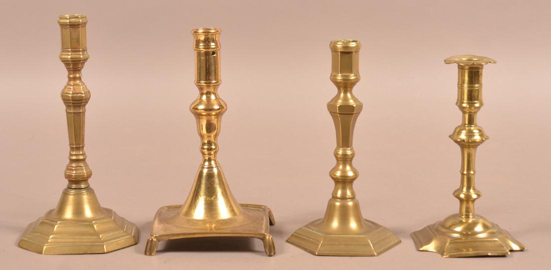 Four 18th/19th Century Brass Candlesticks. (1 of 3)