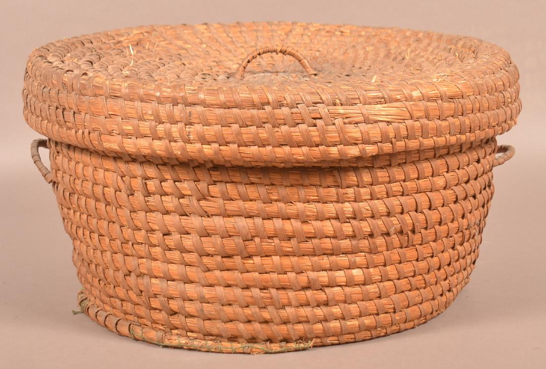 Large Rye Straw Covered Coil Basket.