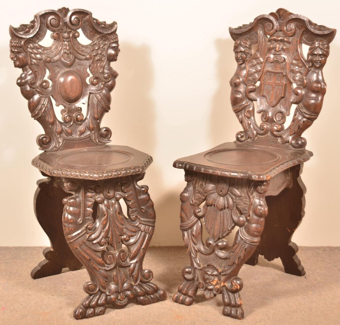 Two Continental Figural Carved Oak Sidechairs. (1 of 4)