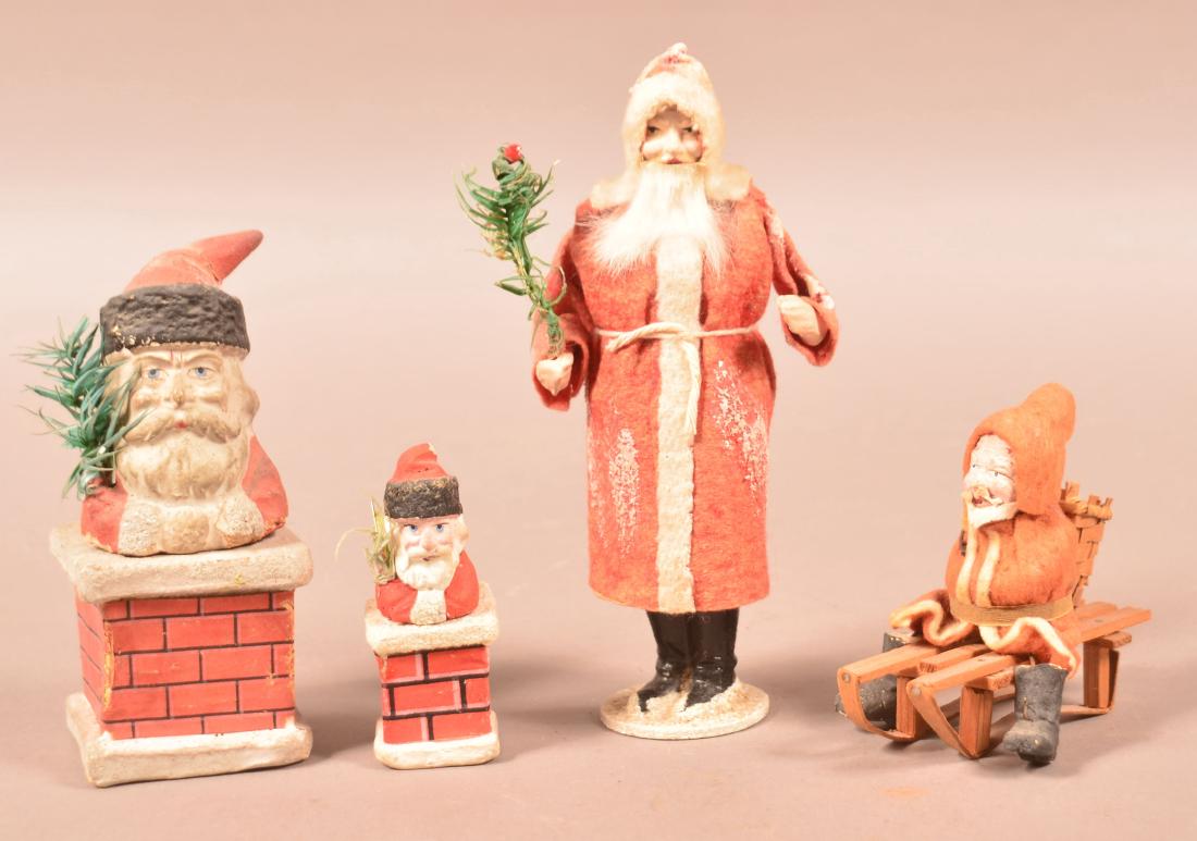 4 German Composition Santa Candy Containers. (1 of 2)