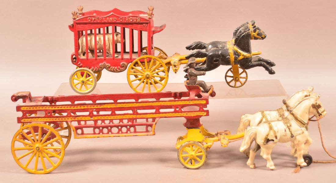 Two Cast Iron Horse Drawn Pull Toys. (1 of 2)