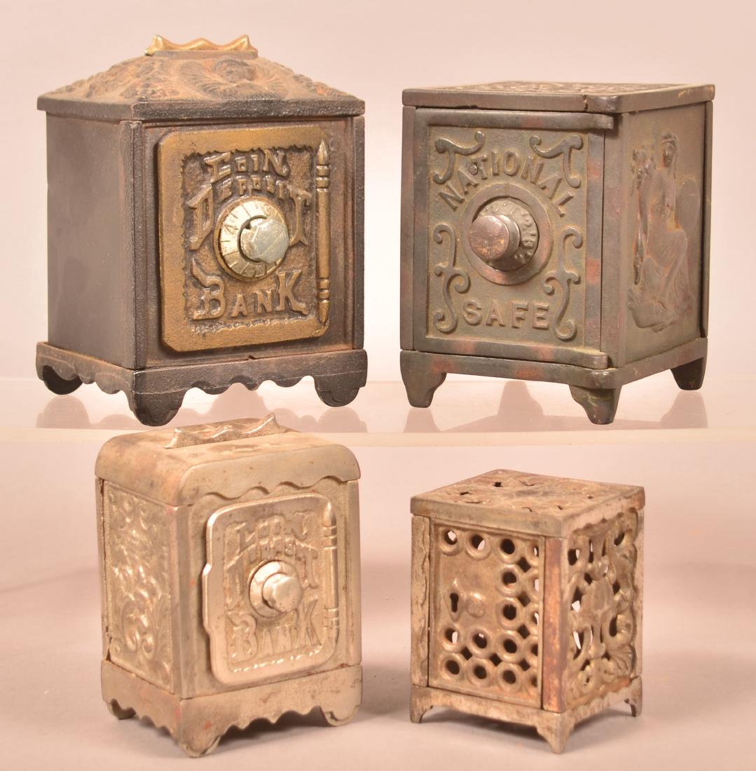 Four Antique/Vintage Cast Iron Safe Still Banks. (1 of 3)
