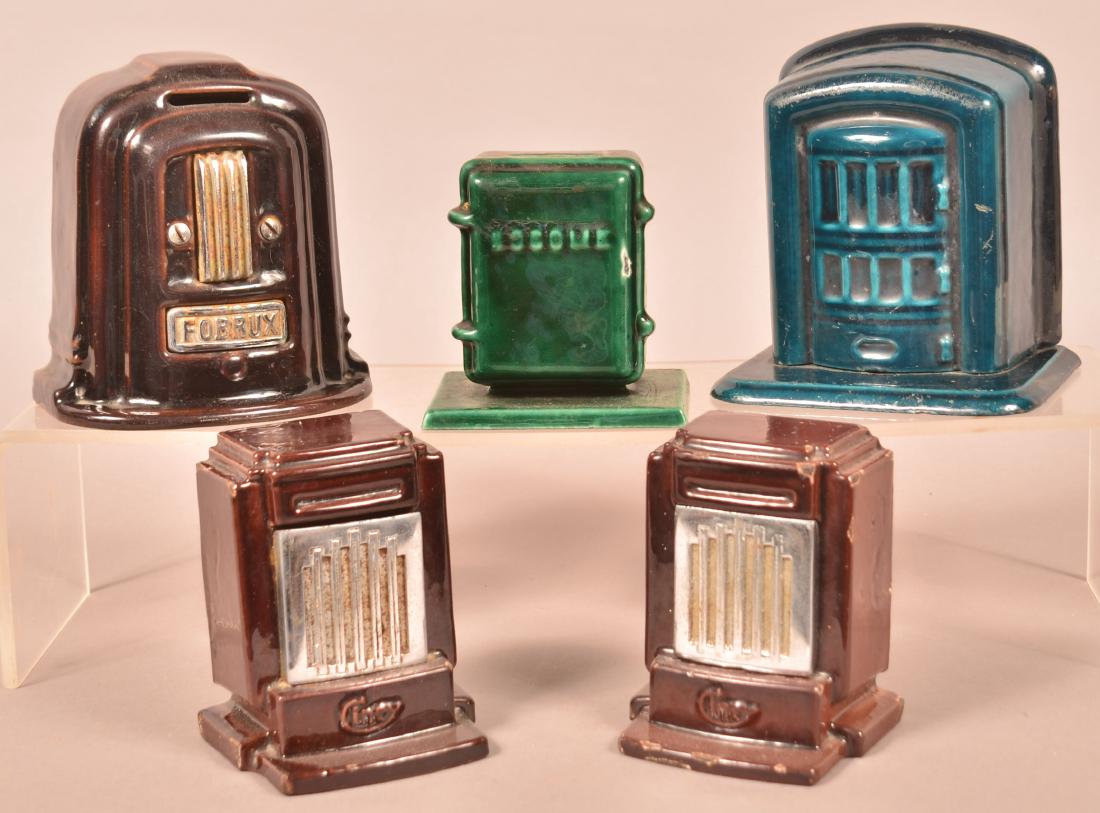 5 Vintage Enameled Cast Iron Heater Still Banks. (1 of 3)