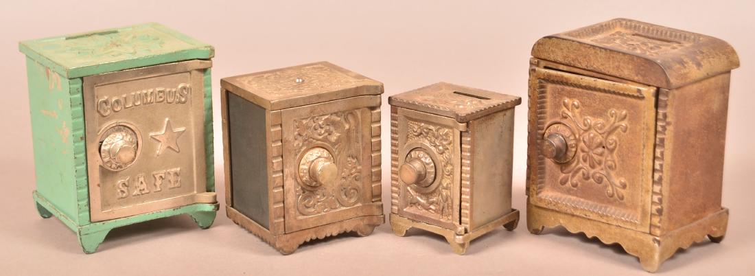 Four Antique/Vintage Cast Iron Safe Still Banks. (1 of 3)