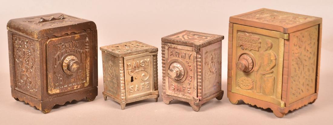 Four Antique/Vintage Cast Iron Safe Still Banks. (1 of 3)