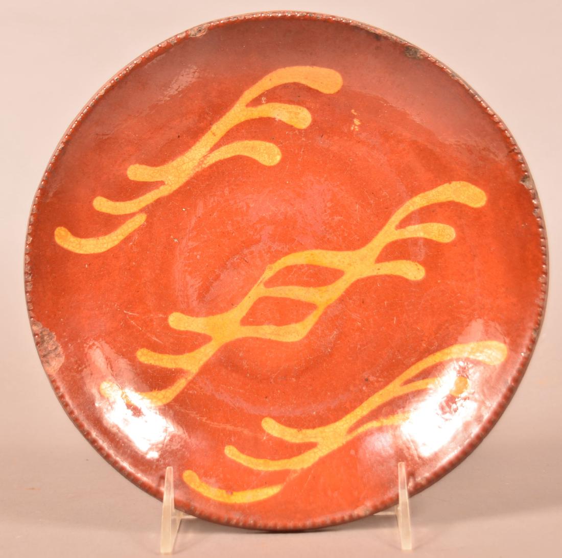 Redware Yellow Slip Decorated Plate. (1 of 2)