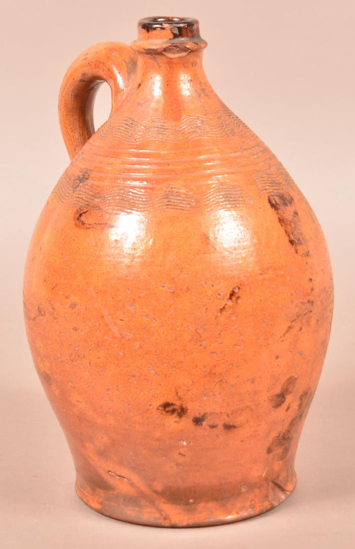 19th Century Glazed Redware Jug. (1 of 3)