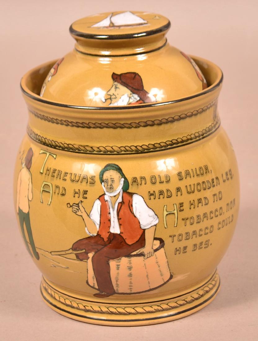 Buffalo Pottery Deldare Ware Tobacco Humidor.: Buffalo Pottery Deldare Ware Tobacco Humidor. Sailors verse transfer. 7-1/2"h. Condition: Very good with pin nip on rim.