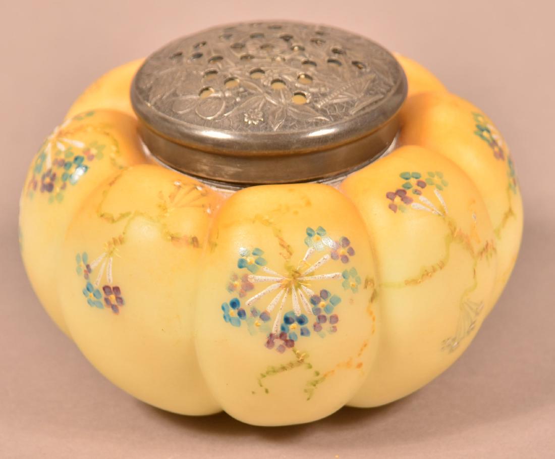 Mt. Washington Tomato Form Muffineer.: Mt. Washington Tomato Form Muffineer. Unsigned, late 19th century. Opal with yellow shading, satin finish, polychrome floral and foliate decoration, original ornate silver-plate two-part lid. 2-3/4"h.