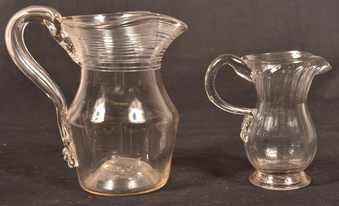 Two 19th Century Colorless Glass Pitchers. (1 of 3)