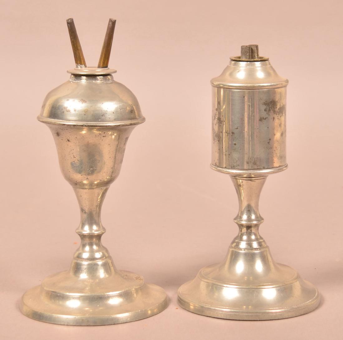 Two American Pewter Whale Oil Lamps.: Two American Mid 19th Century Pewter Whale Oil Lamps. Both signed Smith & Co. Boston, Mass. or Albany, NY. 6-3/4"h. and 7-1/2"h. Condition: Good with dents and wear, some tarnishing.