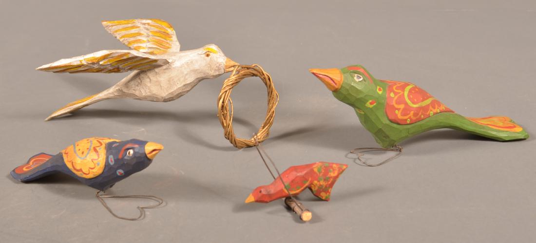 Four Jonathan Bastian Carved and Painted Bird Figures.: Four Jonathan Bastian Carved and Painted Wood Bird Figures. Dated 1991 and 1992. Largest measures 9"l. Condition: Very good.