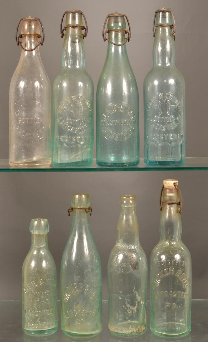 8 Lancaster, PA Antique Embossed Glass Brewery Bottles.