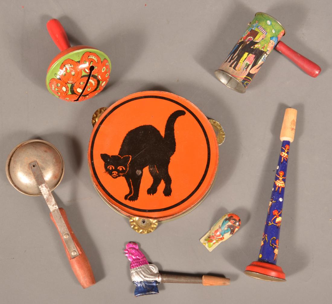 Seven Vintage Tin Noise Makers.: Seven Vintage Tin Noise Makers. Largest measures 8-1/4". Condition: Good with use wear.