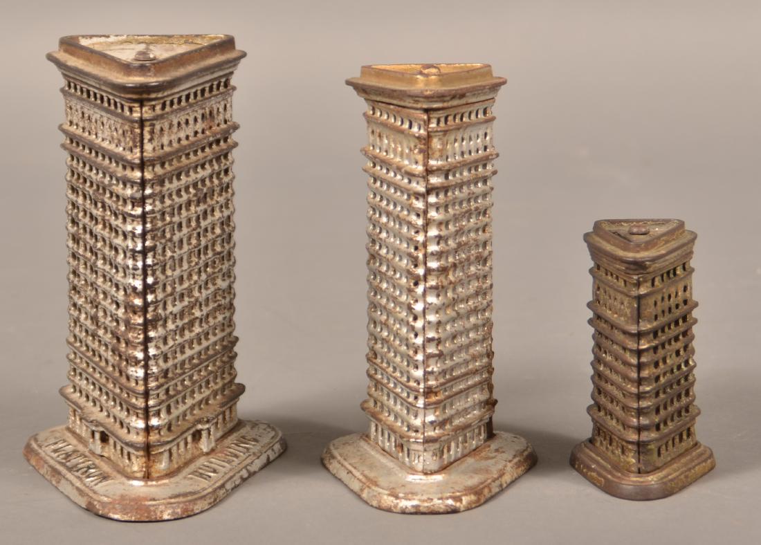 Three Kenton Cast Iron Flat Iron Building Banks. (1 of 2)