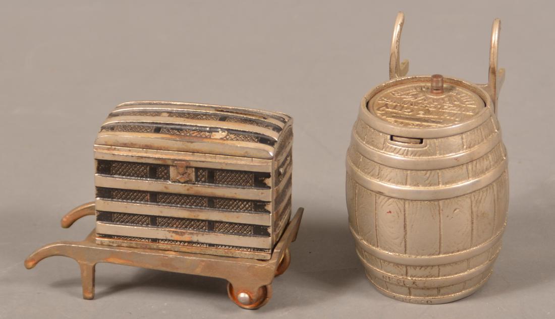 Two Antique Cast Iron Banks on Dollies. (1 of 2)