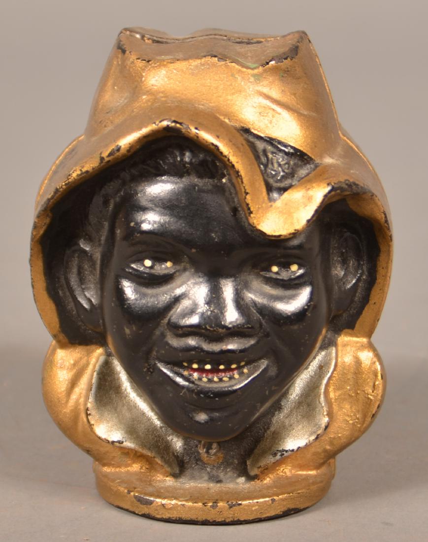 A. C. Williams Two Face Black Boy Cast Iron Still Bank. (1 of 4)