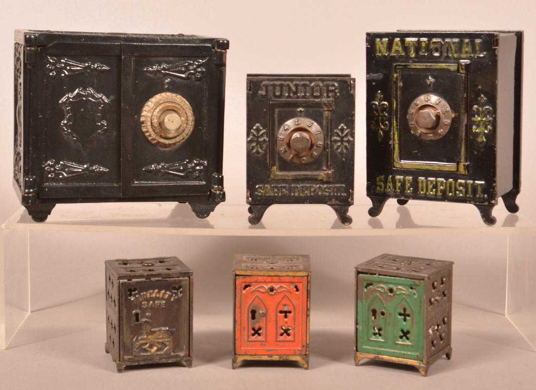 Six Antique Cast Iron Safe Banks. (1 of 3)